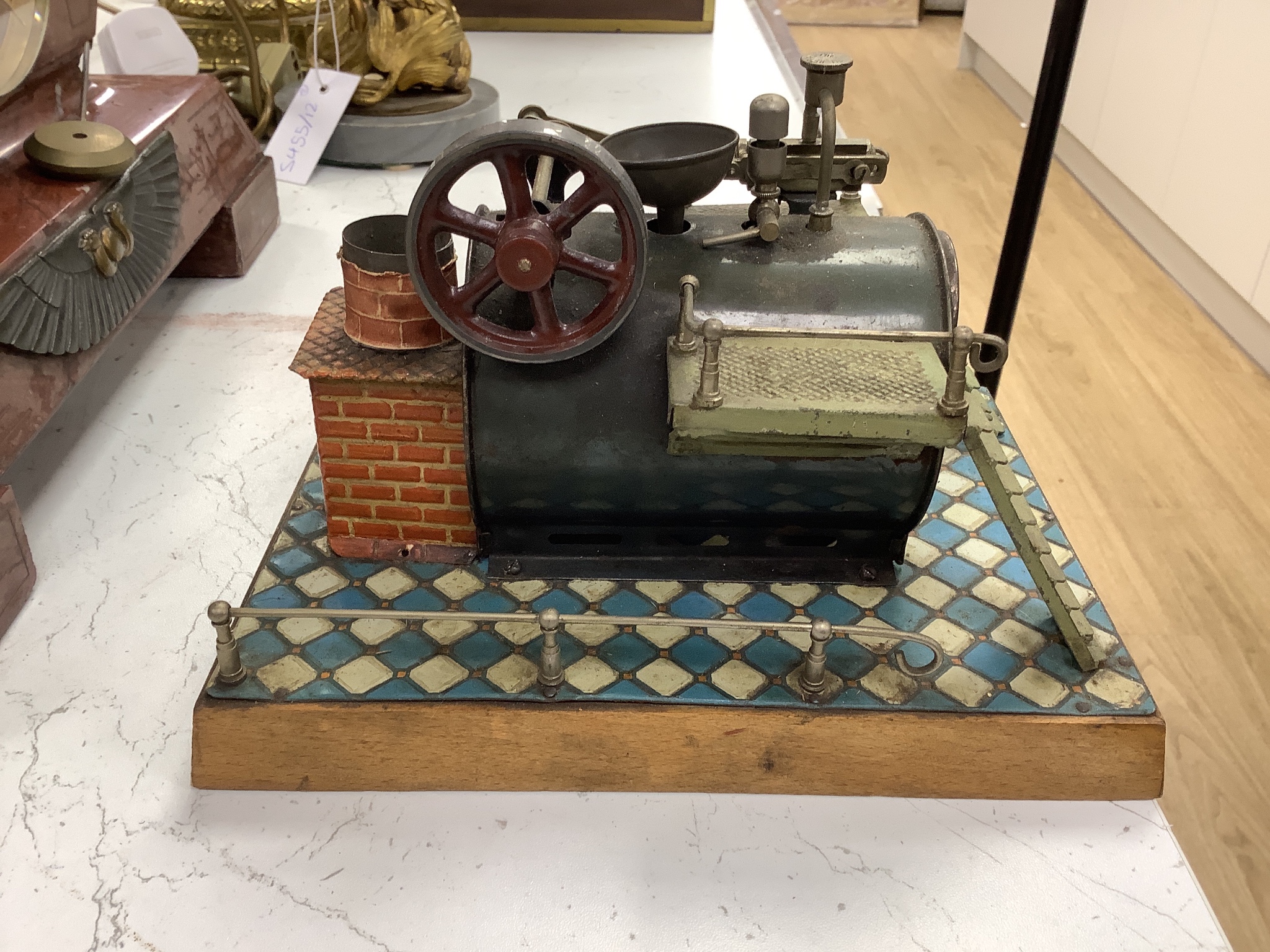A Bing tinplate stationery engine, a boxed Jaques ‘The Angelo’, a toy fort and lead soldiers, a steam engine and other various toys and board games